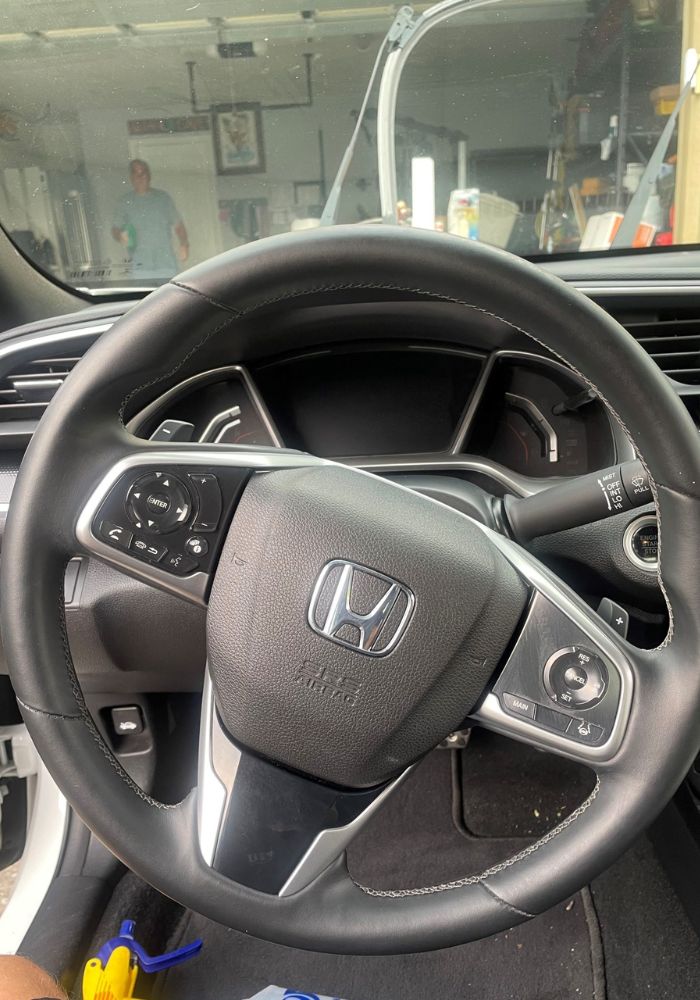 Clean steering wheel interior detailing in Florida